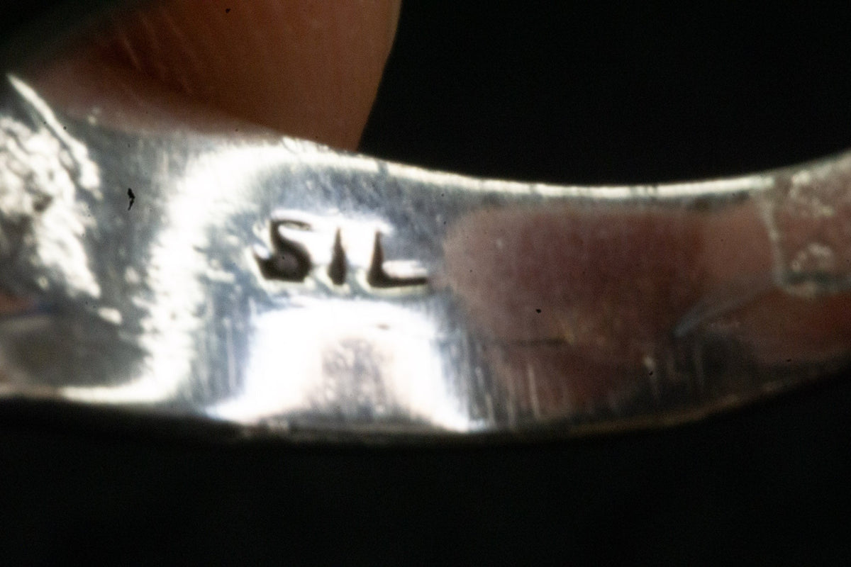 Silver mountain wave ring detail photograph