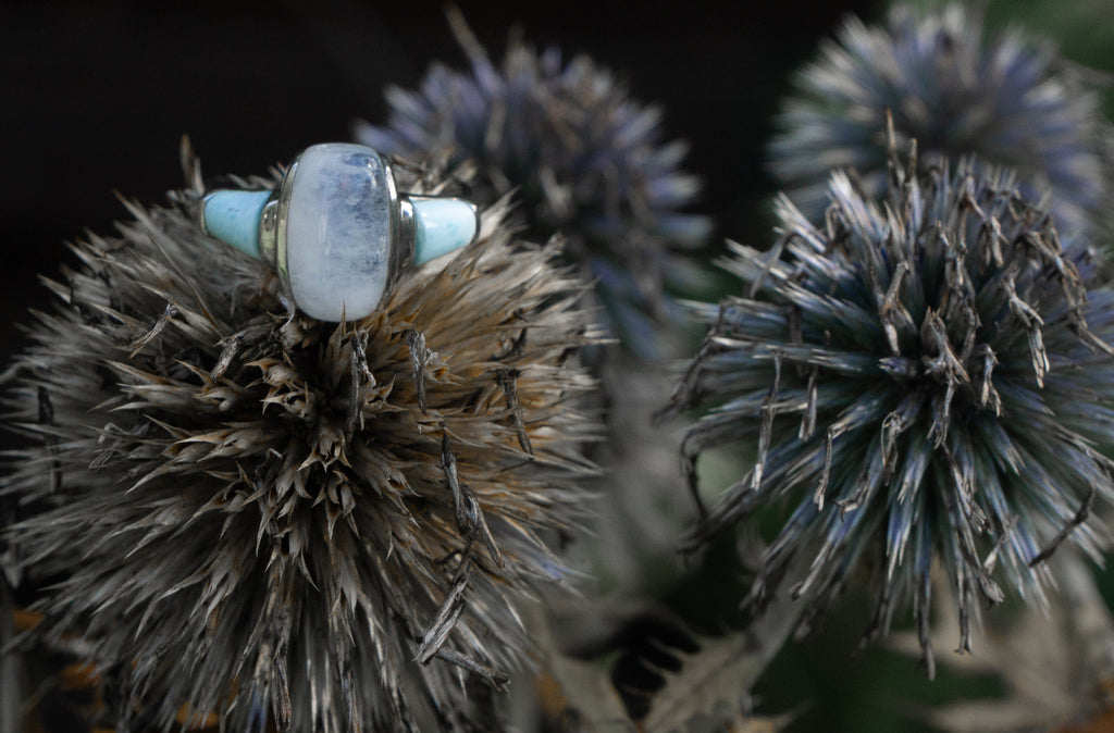 Moonstone and larimar ring editorial photograph