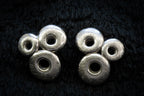 Circle brutalist studs detail photograph