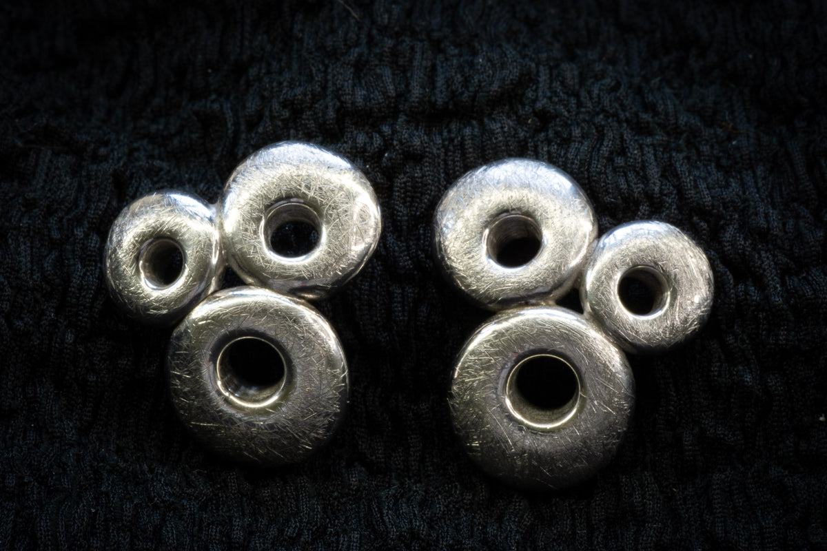 Circle brutalist studs detail photograph