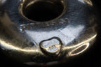 Circle brutalist studs detail photograph