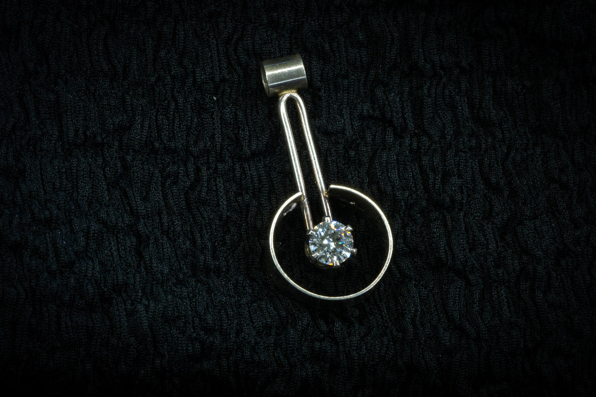 Drop encircled CZ pendant detail photograph