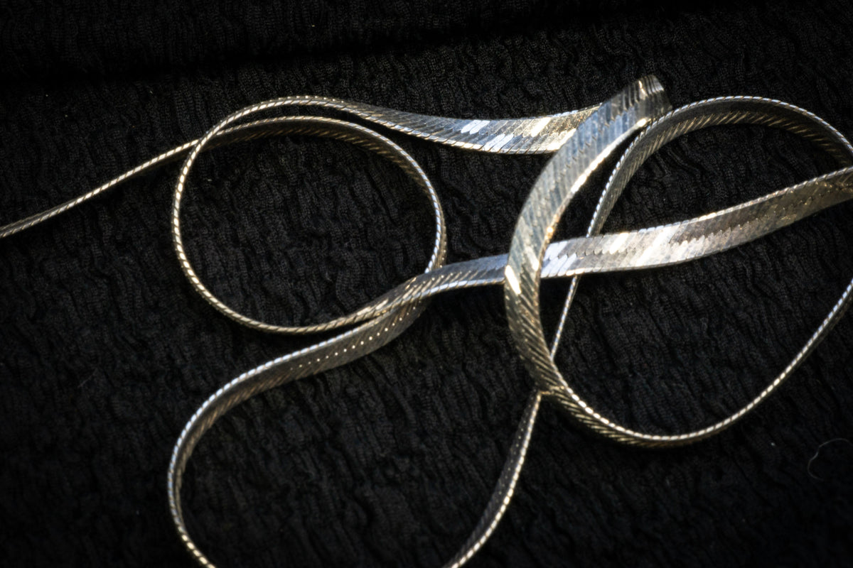 Long herringbone necklace detail photograph