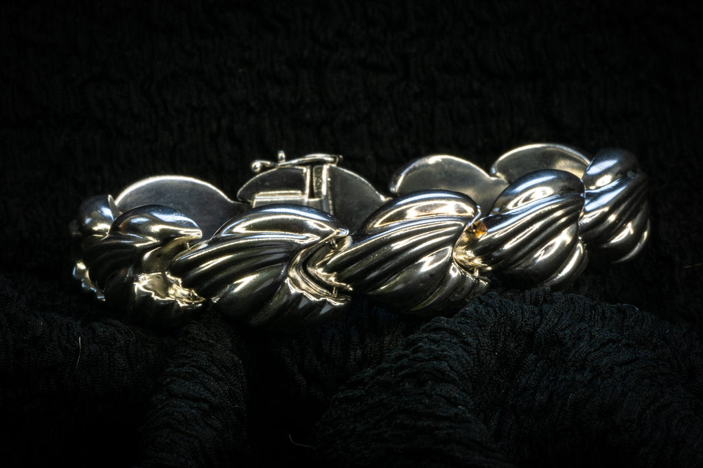 Croissant chain bracelet detail photograph