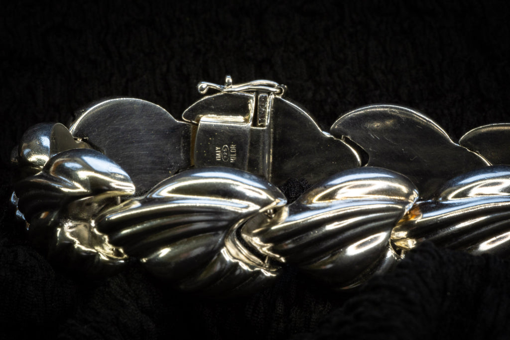 Croissant chain bracelet detail photograph