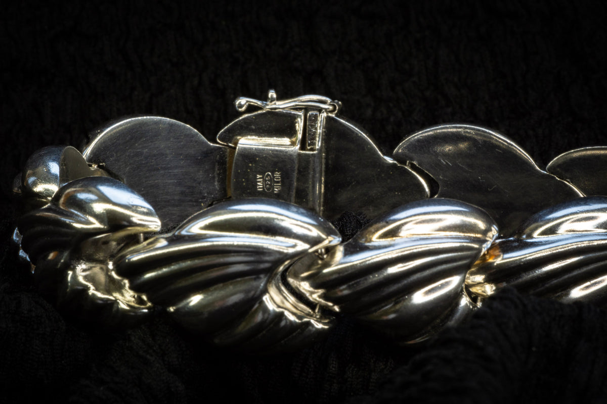 Croissant chain bracelet detail photograph