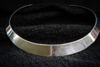 Silver collar detail photograph