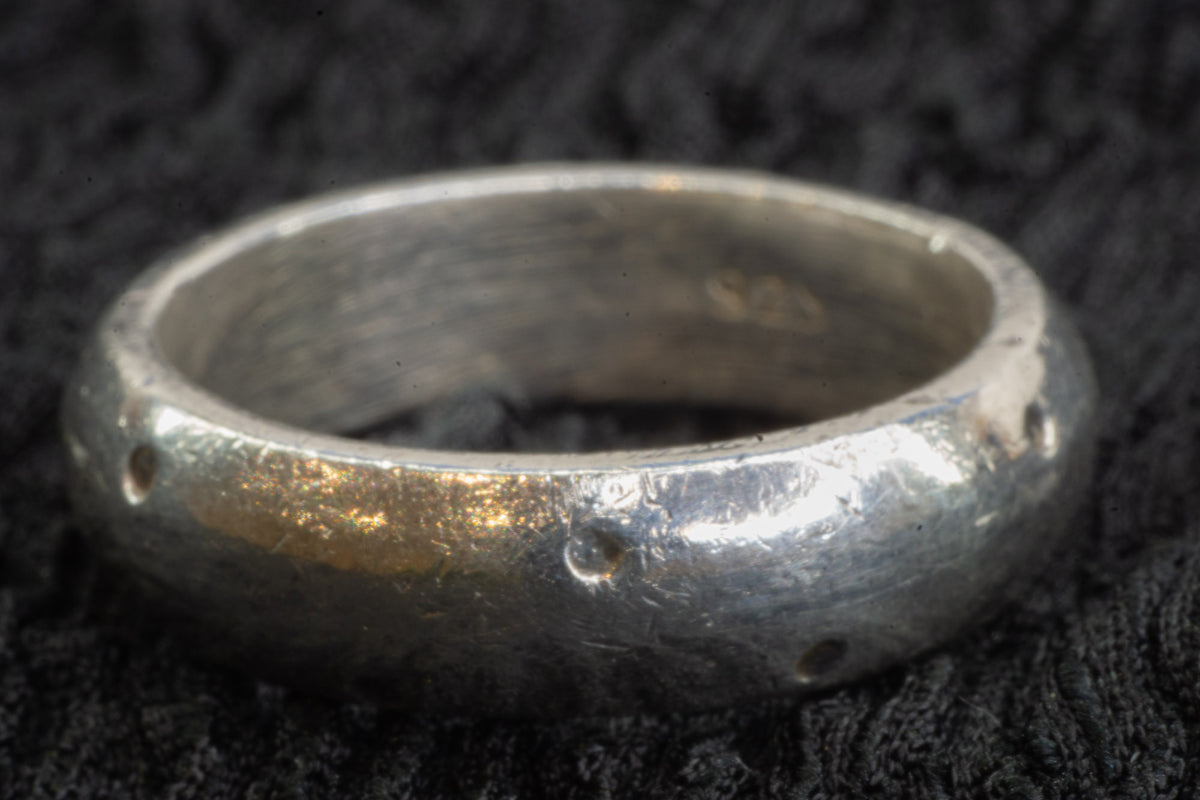 Dotted silver band detail photograph