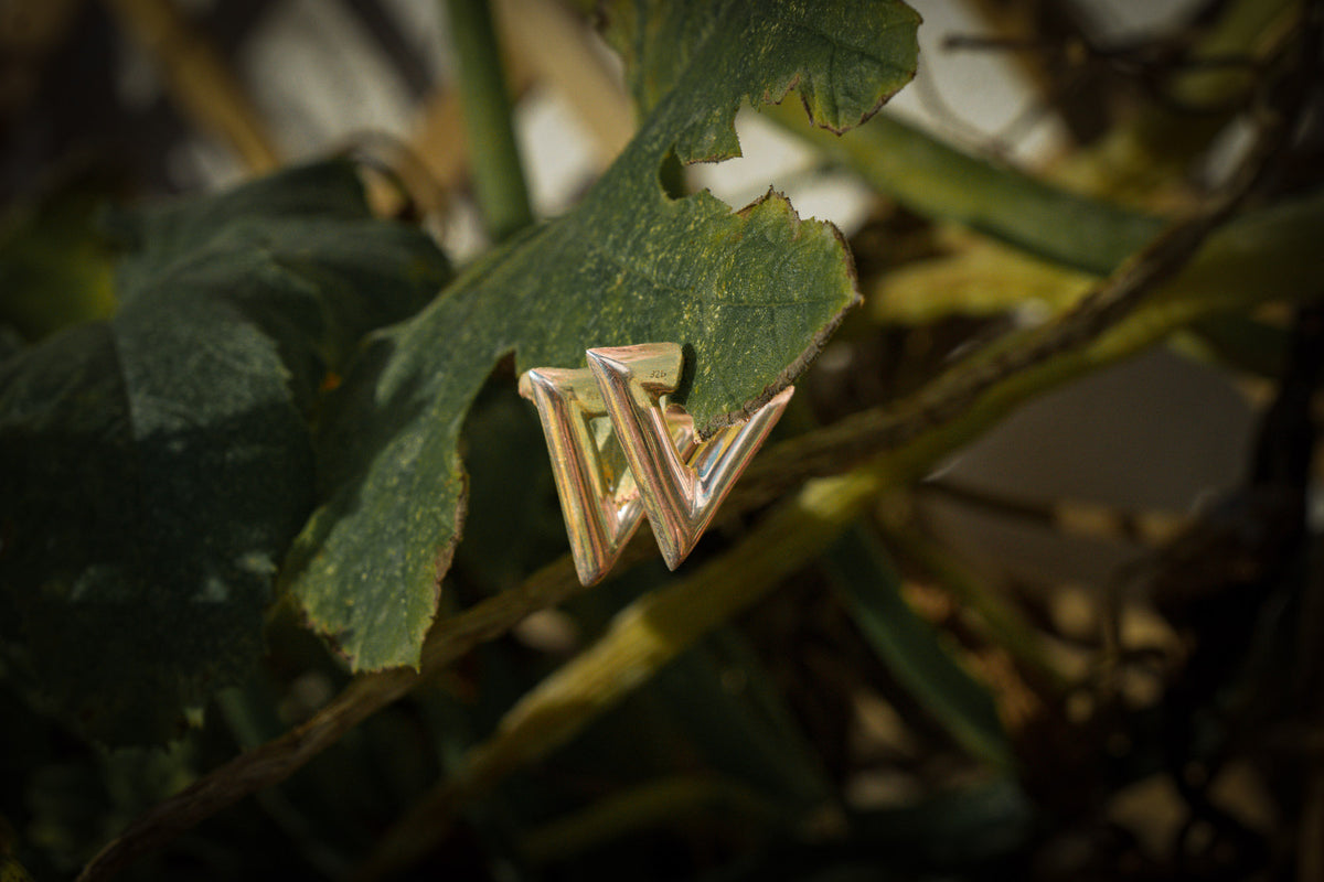 Triangle studs