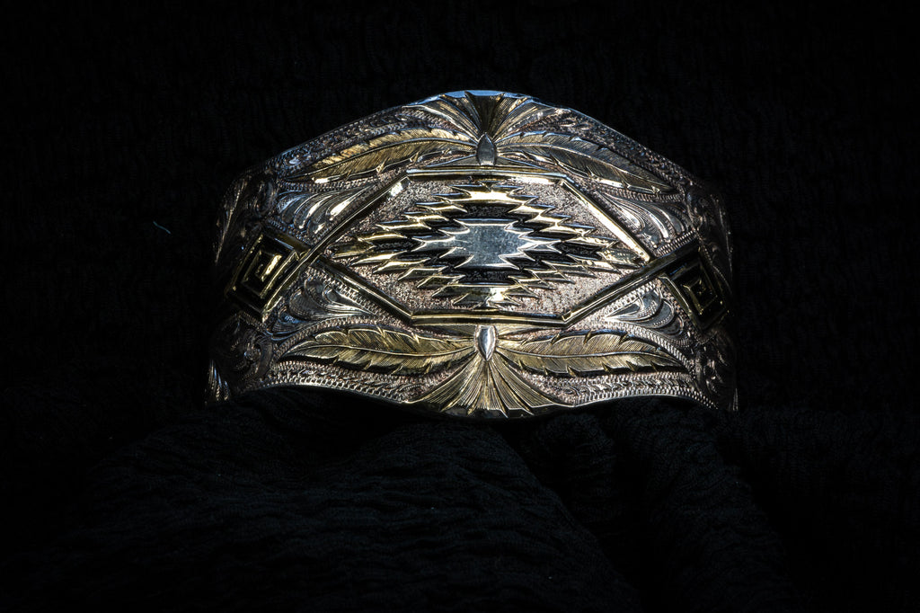 Western curved studs & bangle detail photograph