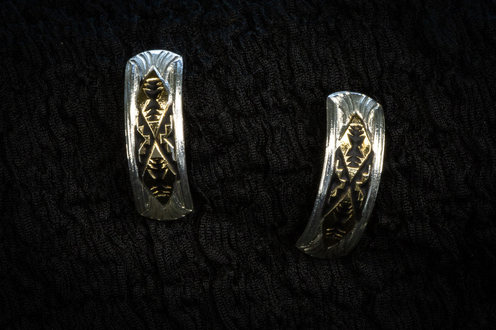 Western curved studs & bangle detail photograph