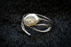 Pearl wave ring detail photograph